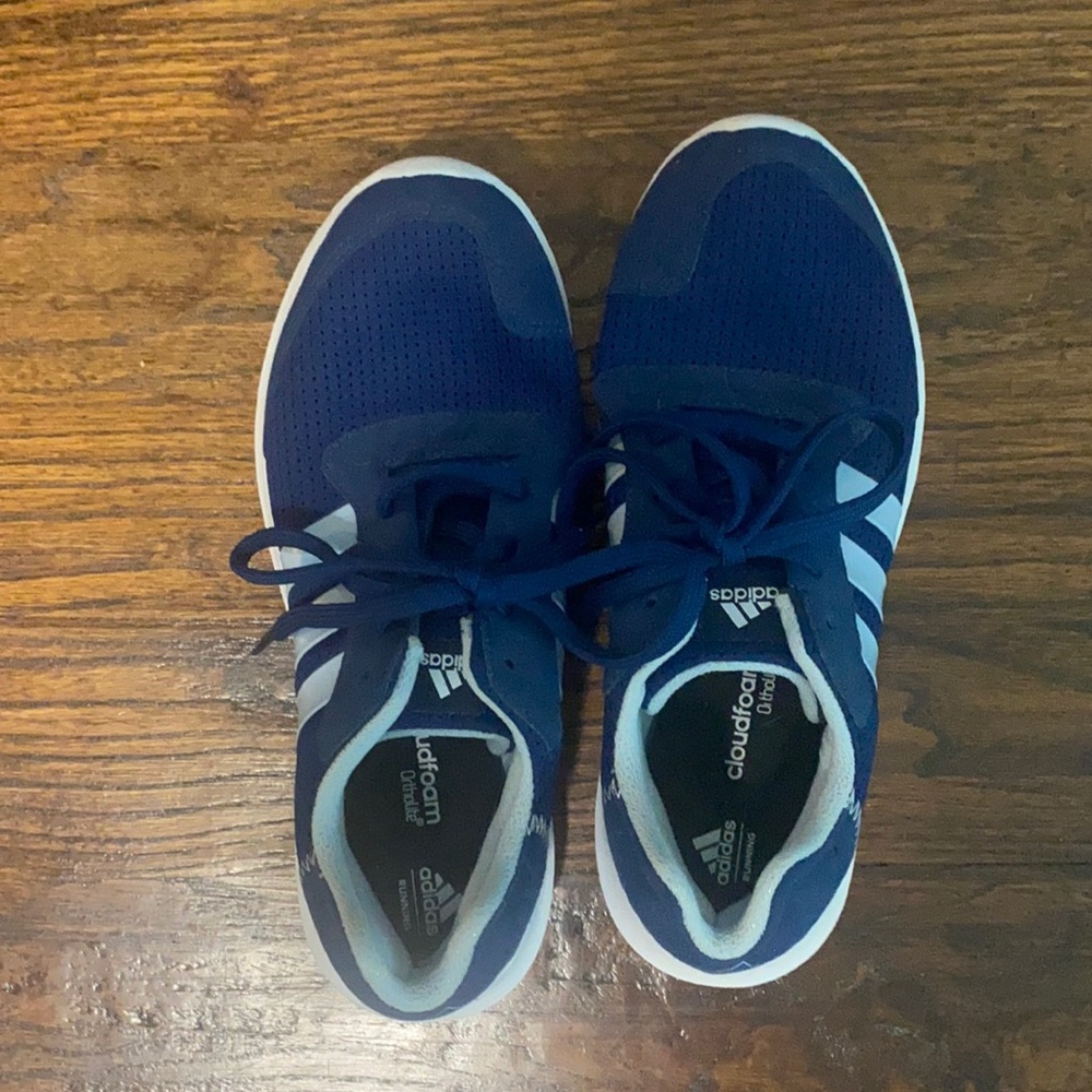 Dark blue with light blue stripes.